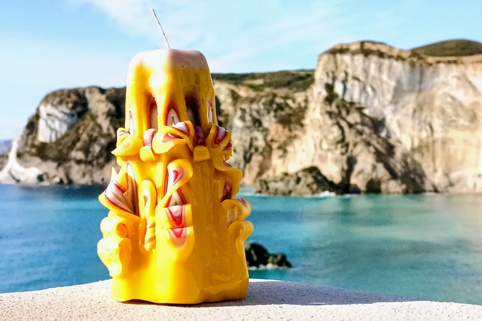 Foto con candele sulla vista di chiaia di luna ponza